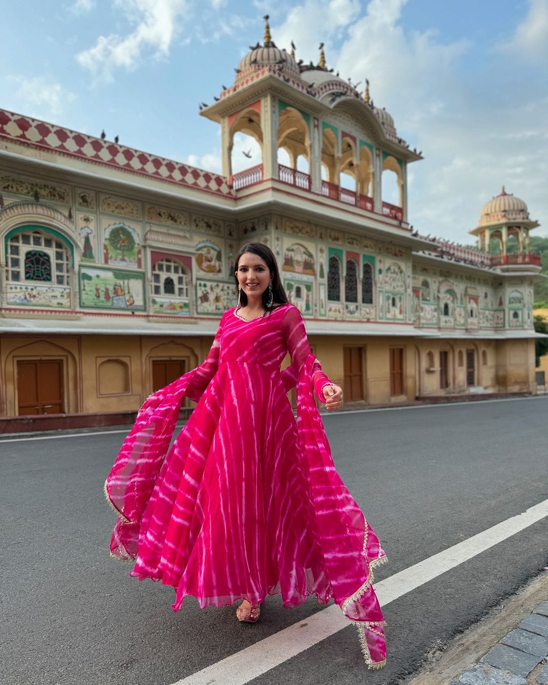 Pure Georgette printed Anarkali suit of huge flair with Designer Lace Border